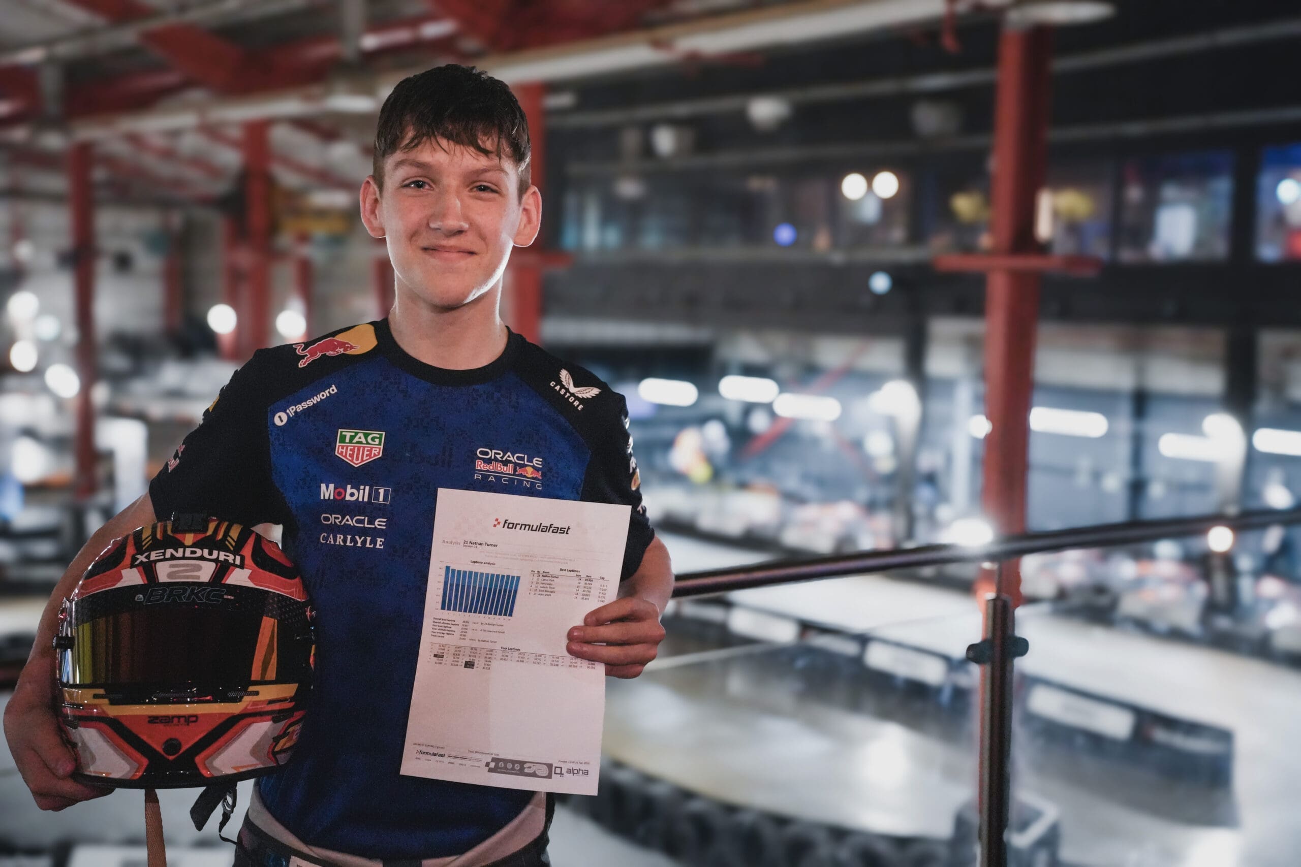 Nathan Turner stands in front of the track after setting a new lap record at Formula Fast